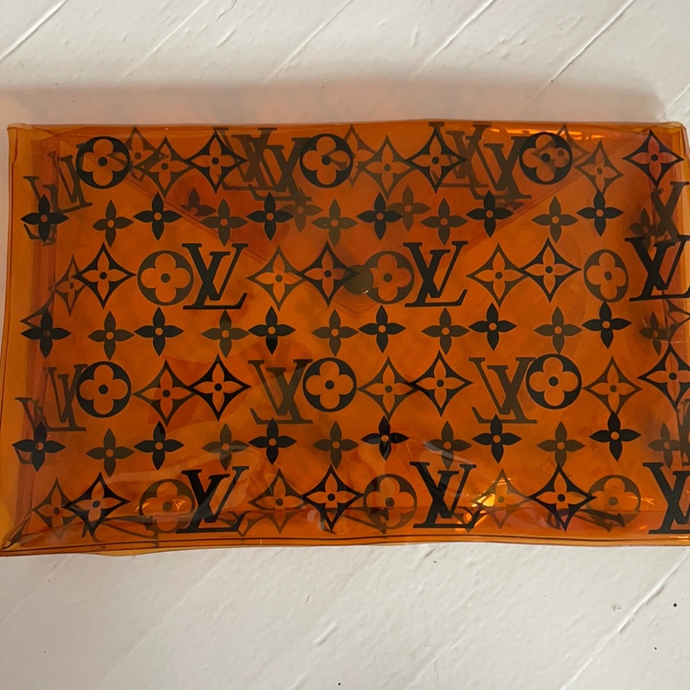 Brand New Authentic Louis Vuitton Orange PVC bag.